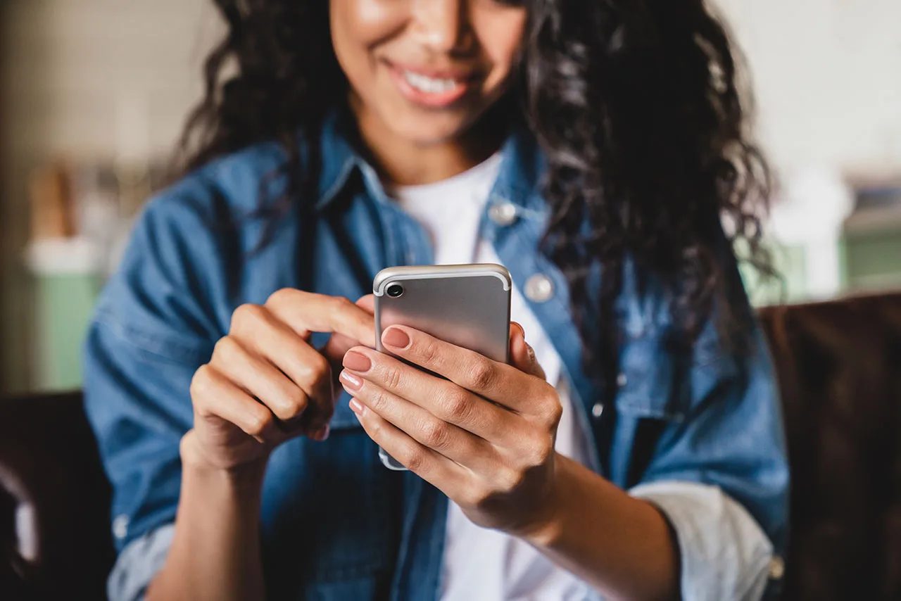 Homeowner searching for local contractors on a smartphone